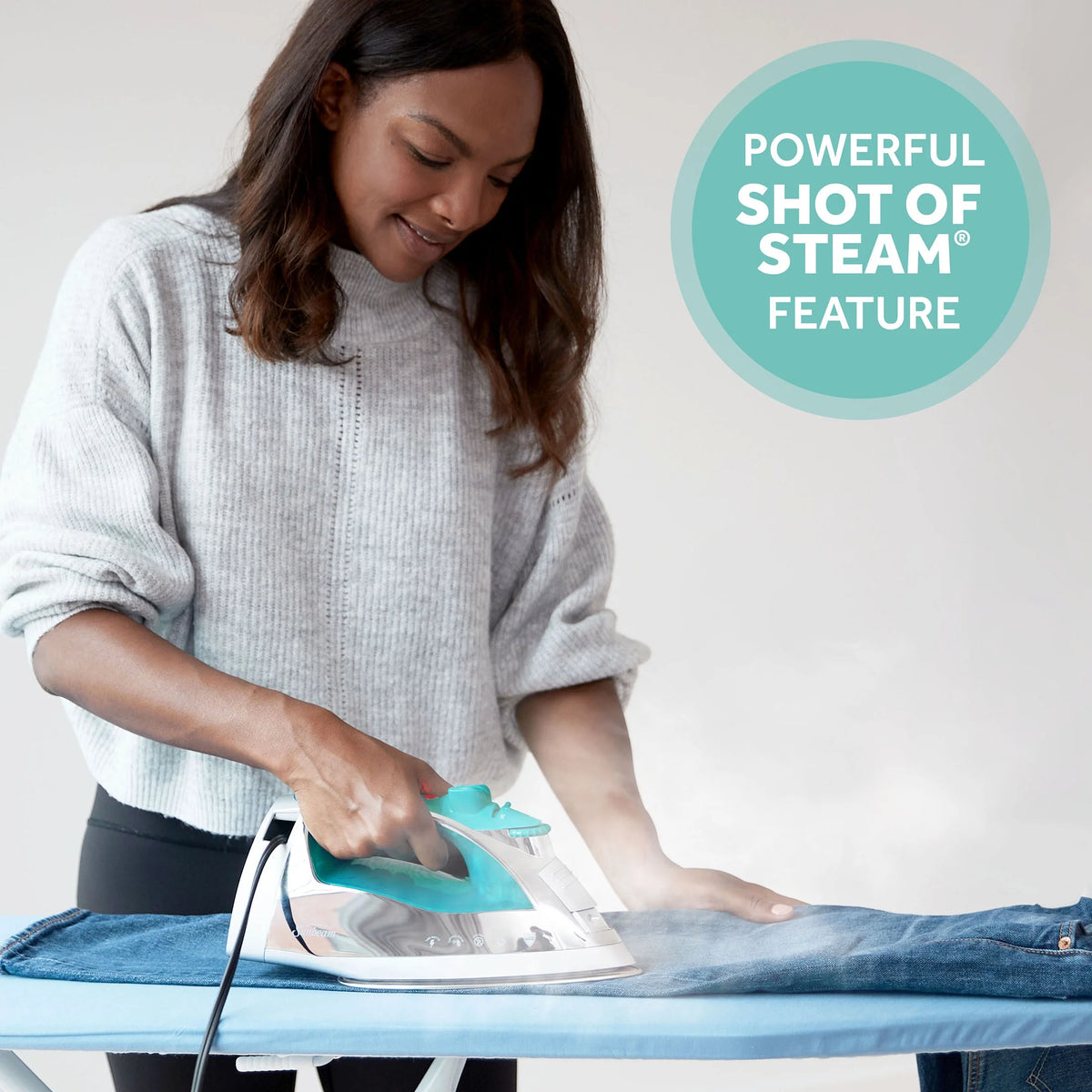 Chrome and Teal Finish Steam Iron with Retractable Cord O3601
